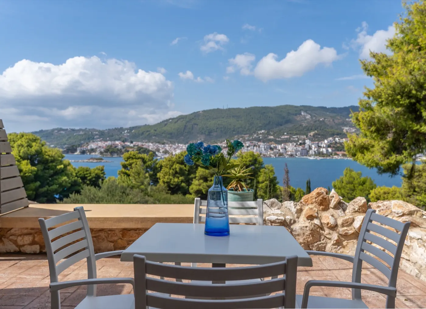 A terrace table looking across the bay to Skiathos Town